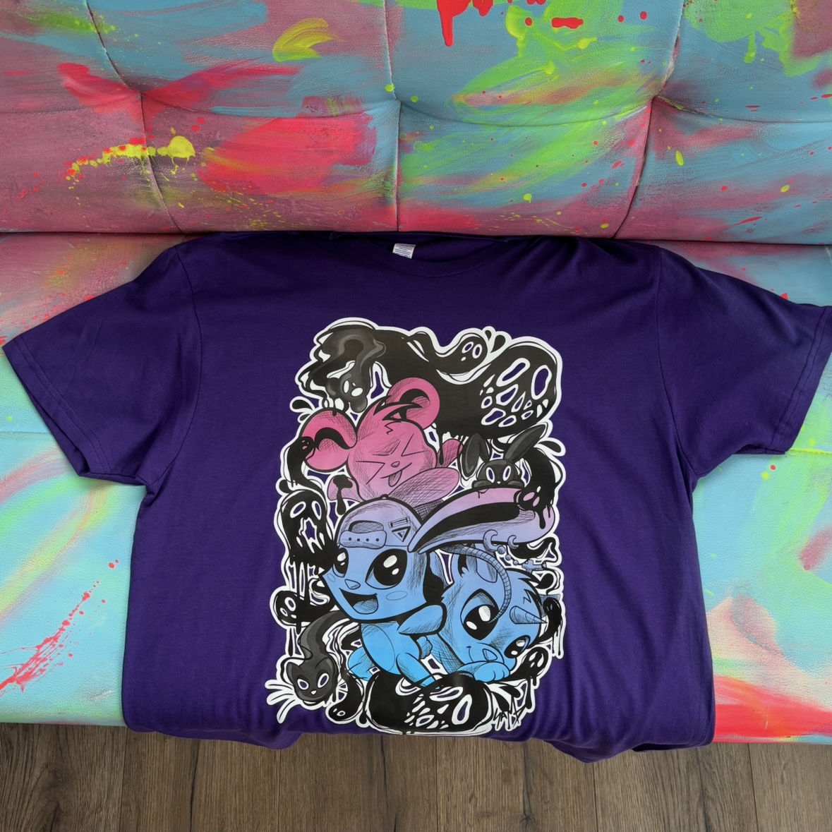 Screenshot t-shirt con pupazzi viola - immagine 1